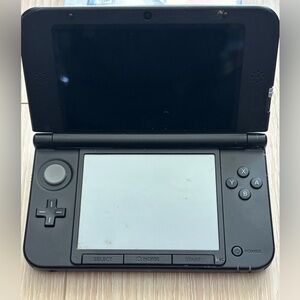 NINTENDO 3DS XL Gaming System with Pokémon Game Bundle, Black.